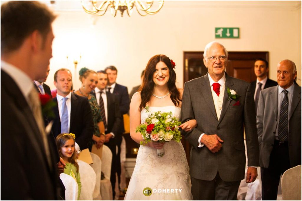 Ettington Park wedding bride walks down the aisle