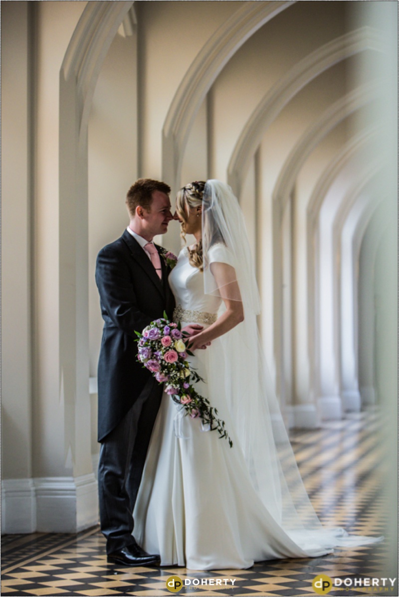Stanbrook Abbey Bride and Groom in corridor