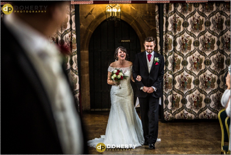 Bride walks down aisle - St Mary's Guildhall