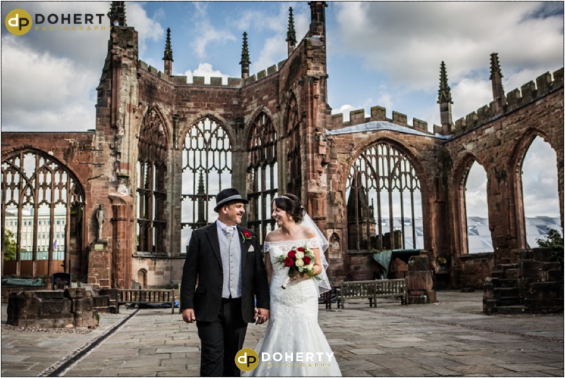 Wedding photo of bride and Groom in Coventry Cathedral ruins