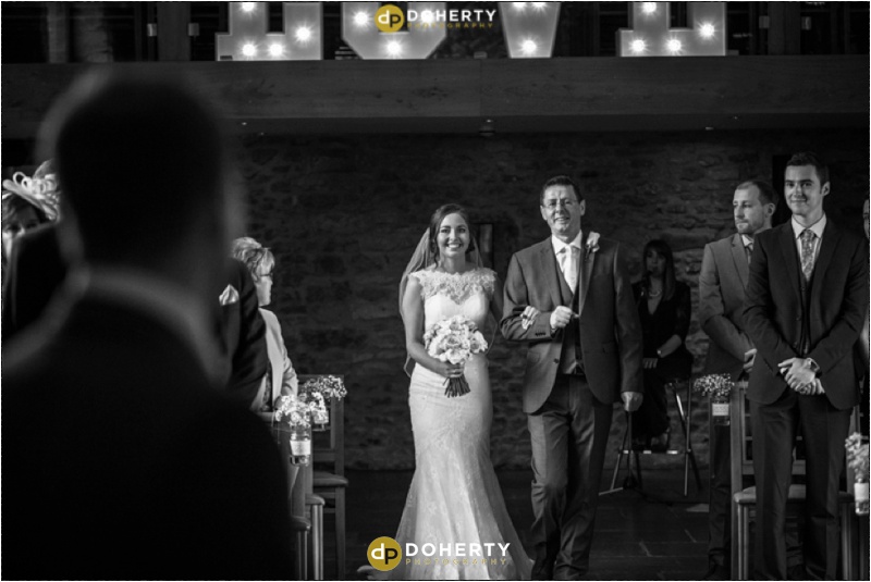 Bride walks down the aisle - Dodford Manor