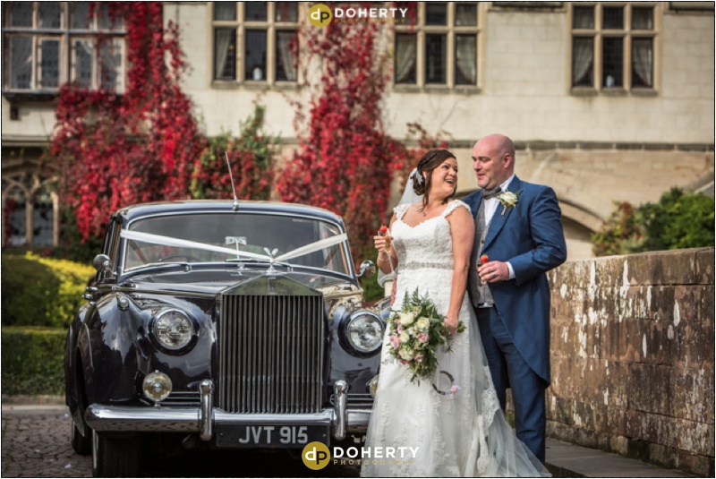 Coombe Abbey Bride and Groom with Wedding Car