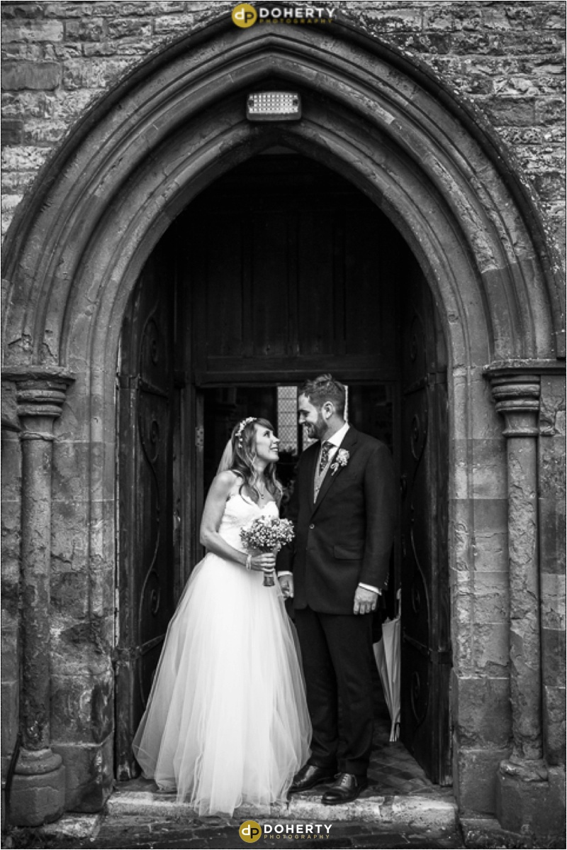 Bride and groom exit church at Harbury - Warwickshire