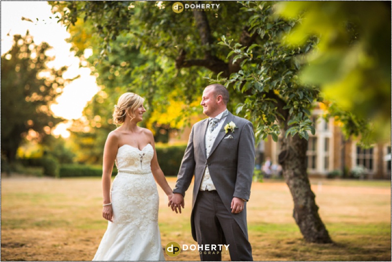 Highgate House Wedding Photo of Bride and Groom in golden light