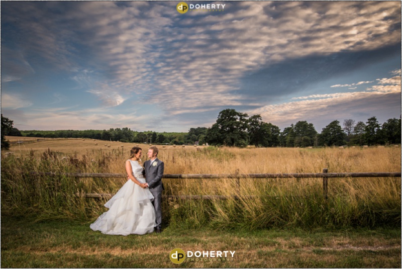 Bride and Groom in Farmers Field - The School House