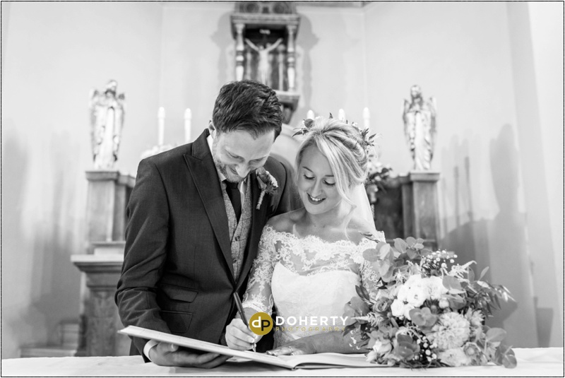 Registrar Signing Wedding Photographer
