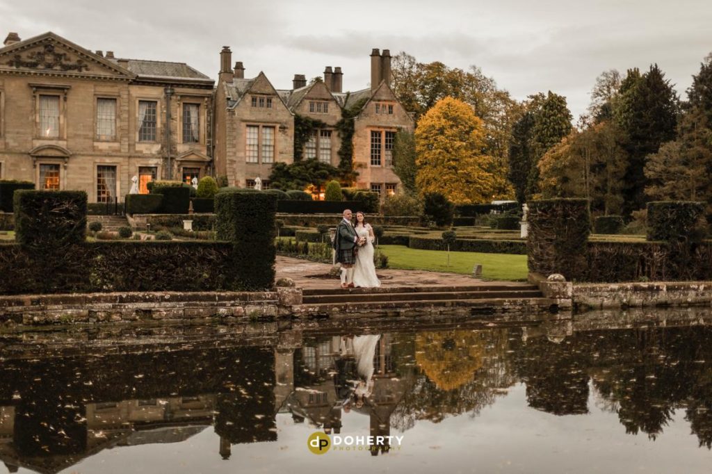 Coombe Abbey - Bride and groom at lake