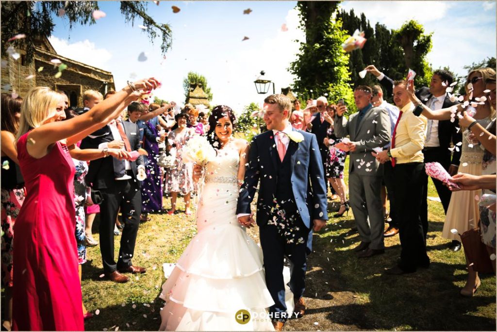 Confetti thrown at Bride and Groom