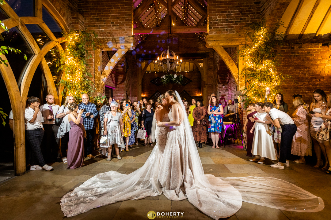 Two brides having first dance at Shustoke Barn