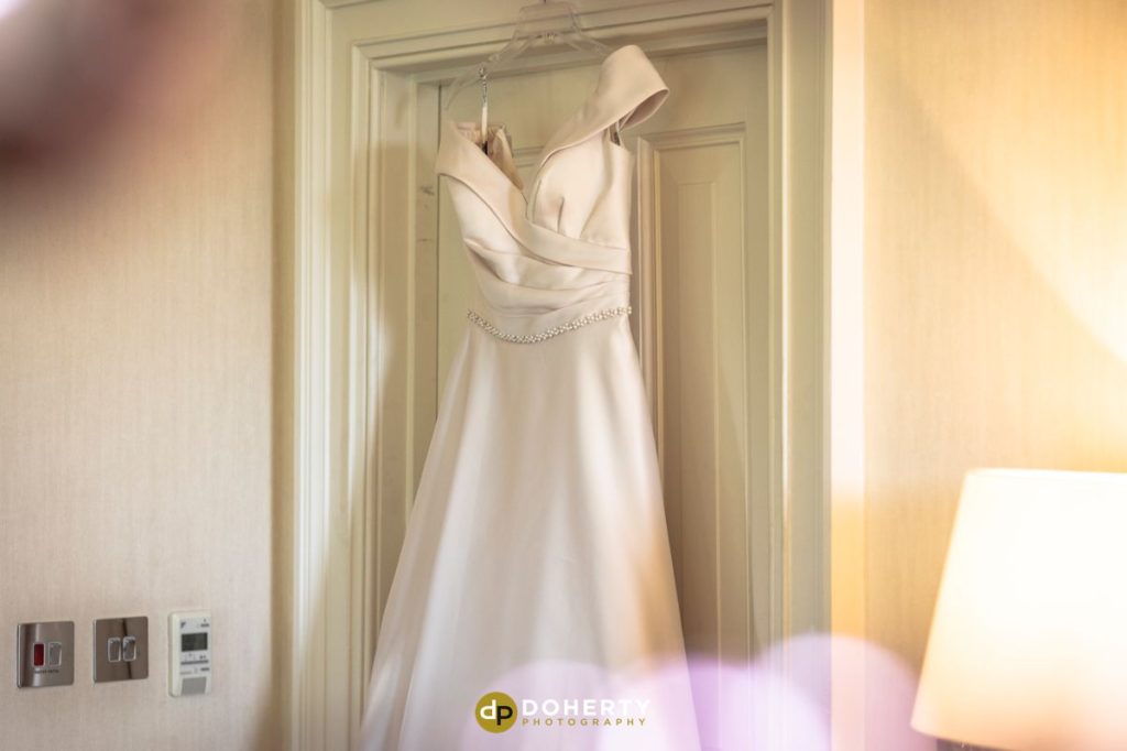 Wedding Dress hanging up- Ettington Park Hotel