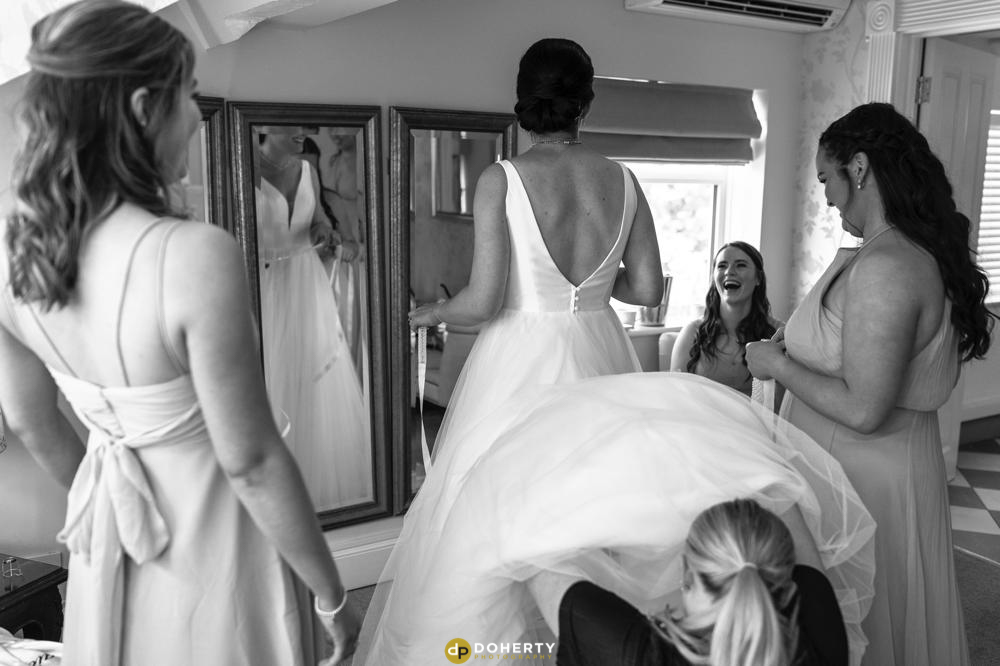 Summer Wedding - Warwick House Photographer capturing preparations with bride and bridesmaids