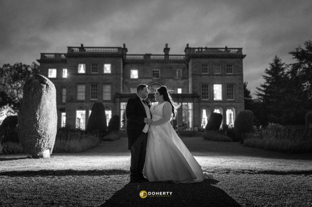 Wedding Photography - Prestwold Hall - Bride and groom at night outside