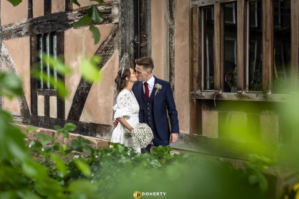 Coventry Registry Office Wedding Photography - Couple kissing