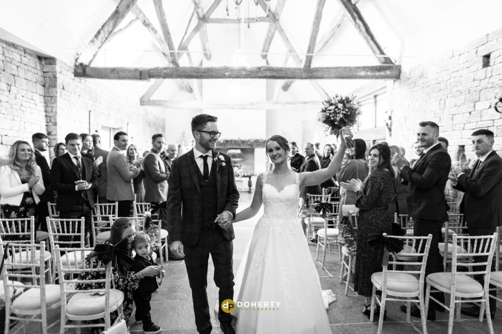 Blackwell Grange Photography - Bride and groom exit ceremony room - Cotswolds