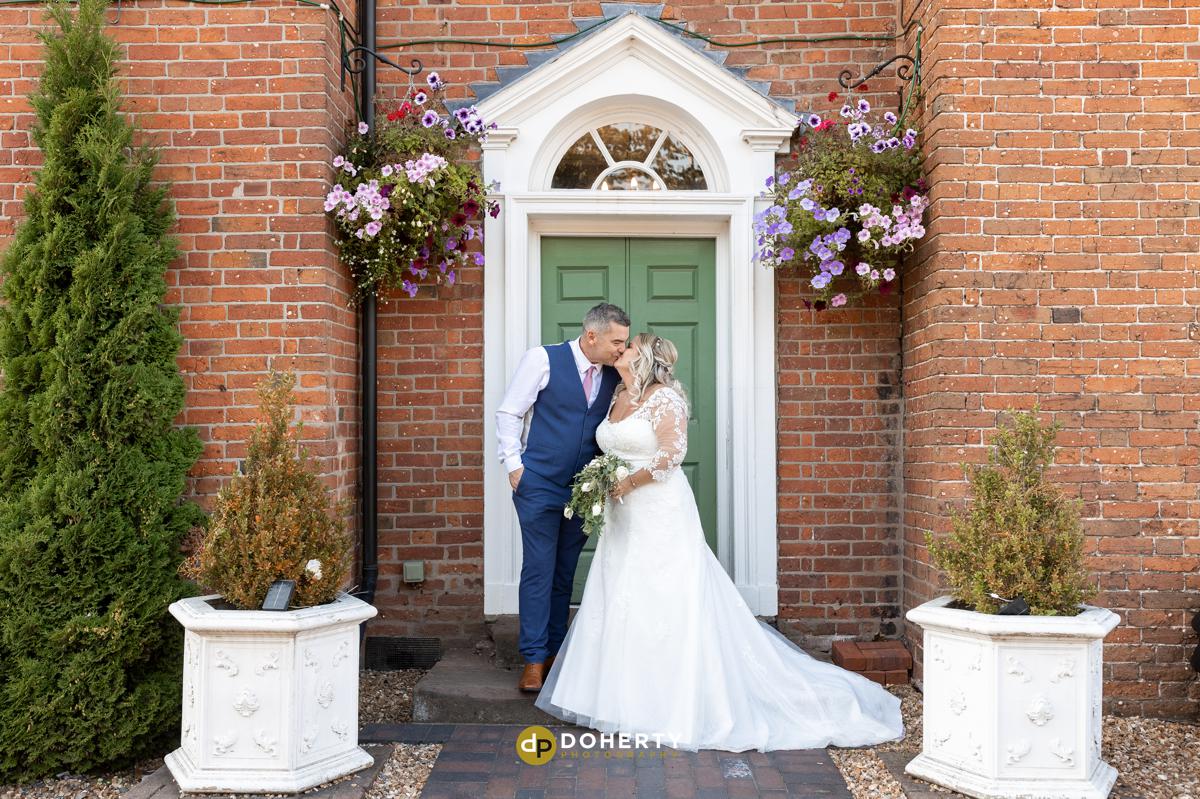 The Barns - Cannock - Bride and groom at entrance
