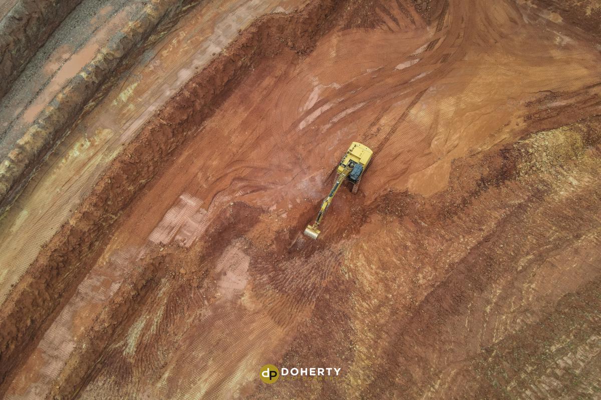 Aerial Photography of digger in sand quarry